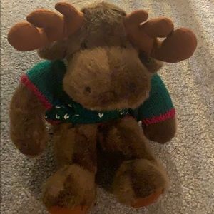 Stuffed moose with holiday sweater